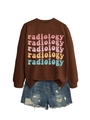 Flat lay of a brown long sleeve sweatshirt with colorful radiology print and ripped denim shorts - S / Coffee Sweatshirt (Color Graphic)