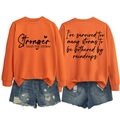 Detailed front and back view of orange sweatshirt with Stronger THAN THE STORM print - S / Orange (Black Font)