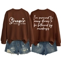 Flat lay of brown sweatshirt with white text prints and distressed denim shorts - S / Coffee (White Font)