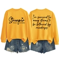 Front and back view of yellow sweatshirt with I've survived too many storms print design - S / Yellow (Black Font)
