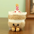 Cute plush birthday cake keychain with strawberry embroidery and a spiral candle - 13cm / Brown