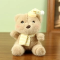 Light brown teddy bear plush keychain wearing yellow and white striped hat and scarf - Light Brown Bear