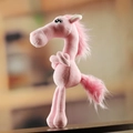 Pink plush horse zodiac mascot standing in a cozy, soft-lit home setting - Funny Standing Horse (25cm) / Pink Horse