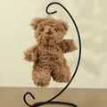 Brown fluffy teddy bear plush keychain with golden lobster clasp hanging on a metal stand - 13 to 18 cm / Dark Brown
