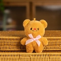 Cute brown plush bear keychain with pink silk bow and detailed embroidery for bags - Pink