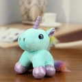 Mint green plush unicorn keychain with rainbow mane and purple sequined horn detail - Sitting Blue