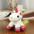 White plush unicorn keychain with pink sequins and vibrant rainbow mane in a cute standing pose - Sitting White