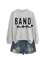 Detail of BAND mom print on a grey long sleeve sweatshirt and distressed denim shorts - Grey (Black Font)