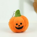 Adorable plush Halloween pumpkin keychain featuring a smiling jack-o-lantern face - Expression 1 / About 7cm