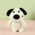 Close-up of white plush dog keychain with black ears and red lip embroidery detail - Beige