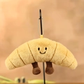 Cute plush croissant keychain pendant with a smiling face and soft brown fur - 9cm / Croissant