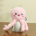 Plush pink jellyfish keychain toy with soft fur and embroidered details in a cup - Pink Octopus