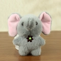 Cute gray plush elephant keychain with pink inner ears and a brown flower detail - Standing Style / Medium Grey