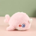 Cute pink plush narwhal keychain with fluffy fur texture and detailed blue embroidery - Pink Narwhal