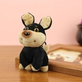 Süßer Plüsch-Hundeanhänger in Schwarz und Braun mit großen gelben Augen und Band - 11cm / Bienenhund