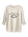 Detail of the soft cream fleece fabric and rugby graphic on the 'Tis The Damn Season sweatshirt - S / Sand