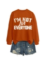 Flat lay of caramel crewneck sweatshirt with I'M NOT FOR EVERYONE print and denim shorts - S / Burnt Orange (White Print)