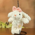 Portachiavi con coniglio di peluche bianco con fiocco rosa e fiore decorativo - 20cm / Rosa