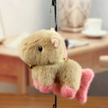 Cute capybara plush keychain with pink fins and golden bell charm for bag decoration - Brown Pink