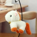 Cute white plush pony keychain with orange accents and a small golden bell charm - Orange and White