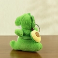 Cute green plush dinosaur keychain with a yellow avocado backpack and metal ring - Avocado / 12cm