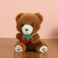 Brown teddy bear plush keychain holding a red strawberry with soft fur detail - L Dark Brown Strawberry Color / About 13cm