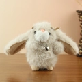 Cute beige plush rabbit keychain with a silver heart pendant on a wooden surface - 13cm / Brown