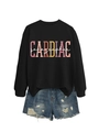 Detail of Cardiac Sonographer print on black sweatshirt with frayed denim shorts - Black Sweatshirt (White Text Pattern)