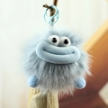 Porte-clés en peluche bleu ciel avec de grosses lèvres de saucisse et de grands yeux - Grande Bouche Gris