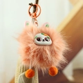 Porte-clés peluche boule orange avec lèvres charnues et petite carotte sur crochet - Visage De Renard Orange
