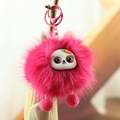 Porte-clés monstre en peluche rose fuchsia avec accessoire carotte et mousqueton - Visage De Renard Rouge