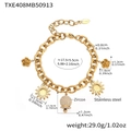 Dettaglio del bracciale charm in acciaio placcato oro 18k con ciondoli floreali e zirconi - Bracciale Oro (TXE408)