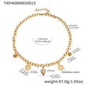 Dettaglio della collana a catena dorata 18k con campanello in zircone e ciondoli a fiori - Collana Oro (TXP408)