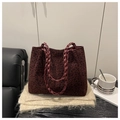 Detail of burgundy leopard print tote bag with woven leather handles on a beige shawl - Without Pendant / Burgundy