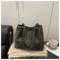 Detail of leopard print tote bag with unique olive green woven handles on a textured shawl - Without Pendant / Dark Green