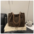 Macro shot of large leopard print tote bag with woven brown handles and textured fabric - Without Pendant / Brown