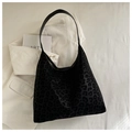 Borsa tote nera con stampa leopardata, finitura testurizzata e tracolla larga - Nero