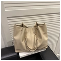 Creamy off-white large capacity tote bag with elegant gold chain handle detail - Khaki