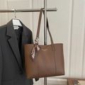 Brown leather tote bag with elegant geometric scarf detail and gold lettering - Brown