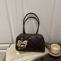 Dark brown quilted tote bag with cute plush monster charm and smooth metal zipper detail - Coffee with Pendant