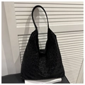 Detailed view of the leopard print pattern on a black velvet hobo shoulder bag for women - Black