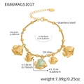 Detail of gold stainless steel bracelet with blue tropical fish charms and ball chain - Light Blue Enamel Fish Charms (E686)