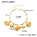 Macro shot of stainless steel gold shell charm bracelet showing detailed size parameters - Gold Scallop Charms (E687)