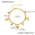 Detailed view of golden stainless steel bracelet with heart charms and sizing annotations - Heart And Bell Charms (E692)