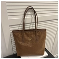 Close-up of brown leopard print tote bag with gold logo on white shutter background - No Pendant / Brown