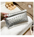 Detail of silver metallic clutch bag with rivets on a stylish textured background - Silver