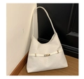Detail shot of white woven texture on a hobo shoulder bag with a gold buckle clasp - Khaki