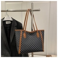 Detalle del bolso tote vintage con monograma, asas de cuero y lona con patrón marrón - Negro