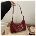Chic wine red hobo bag with glossy patent leather finish and silver buckle hardware - Red