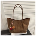 Detail of a brown faux suede tote bag with a colorful plush pom-pom and wooden bead charm - Brown with Pendant